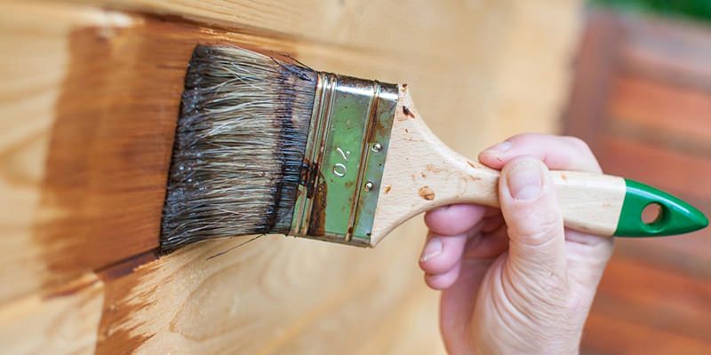 Покраска деревянного дома из клееного бруса фото